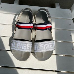 Tommy Hilfiger Bekett. With silver and white scrapes.